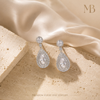 Close-up of the Auristelle moissanite drop earrings and teardrop silhouette