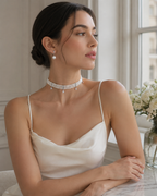 Close-up of the Pearl Radiance Choker pearl and zircon detailing