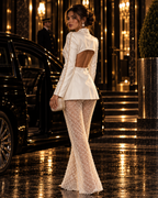 Perline evening look, three-quarter back view with open-back blazer and sheer pearl pants