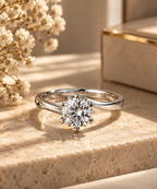 Astra Diamond Ring lifestyle view on warm ivory stone with round lab-grown diamond