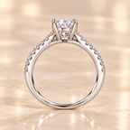 Macro view of the Aurora Diamond Ring round brilliant lab-grown diamond and zircon pavé