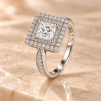 Three-quarter view of the Imperial Diamond Ring with princess-cut center stone and pavé shoulders