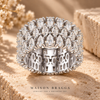 Close-up of the Élarisse Moissanite Ring with bezel-set pear-shaped stones