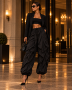 Maison Bragga Veyra sculpt parachute pants in Black styled for an evening look with blazer and heels