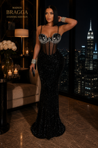 Maison Bragga Noctéa red velvet sequin evening gown in a dramatic luxury evening setting
