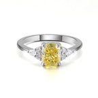 Soléa Ring detail with cushion-cut yellow center diamond