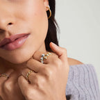 Close-up of the Duo Sphère adjustable open ring and polished sphere details