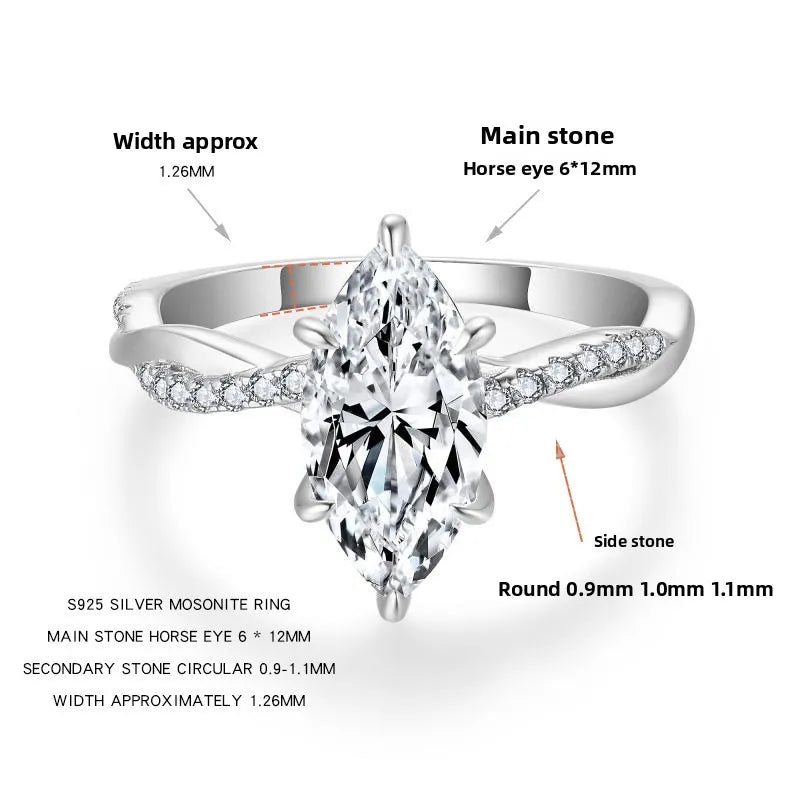 Alternate product view of the Sélyria marquise moissanite ring