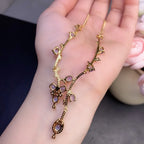 Isabella Tanzanite Necklace detail with brilliant accent stones