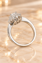 Rear profile of the Versailles Ring showing the raised pear-cut setting and open gallery beneath the double halo